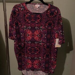 Lularoe xxs pink and purple Irma shirt